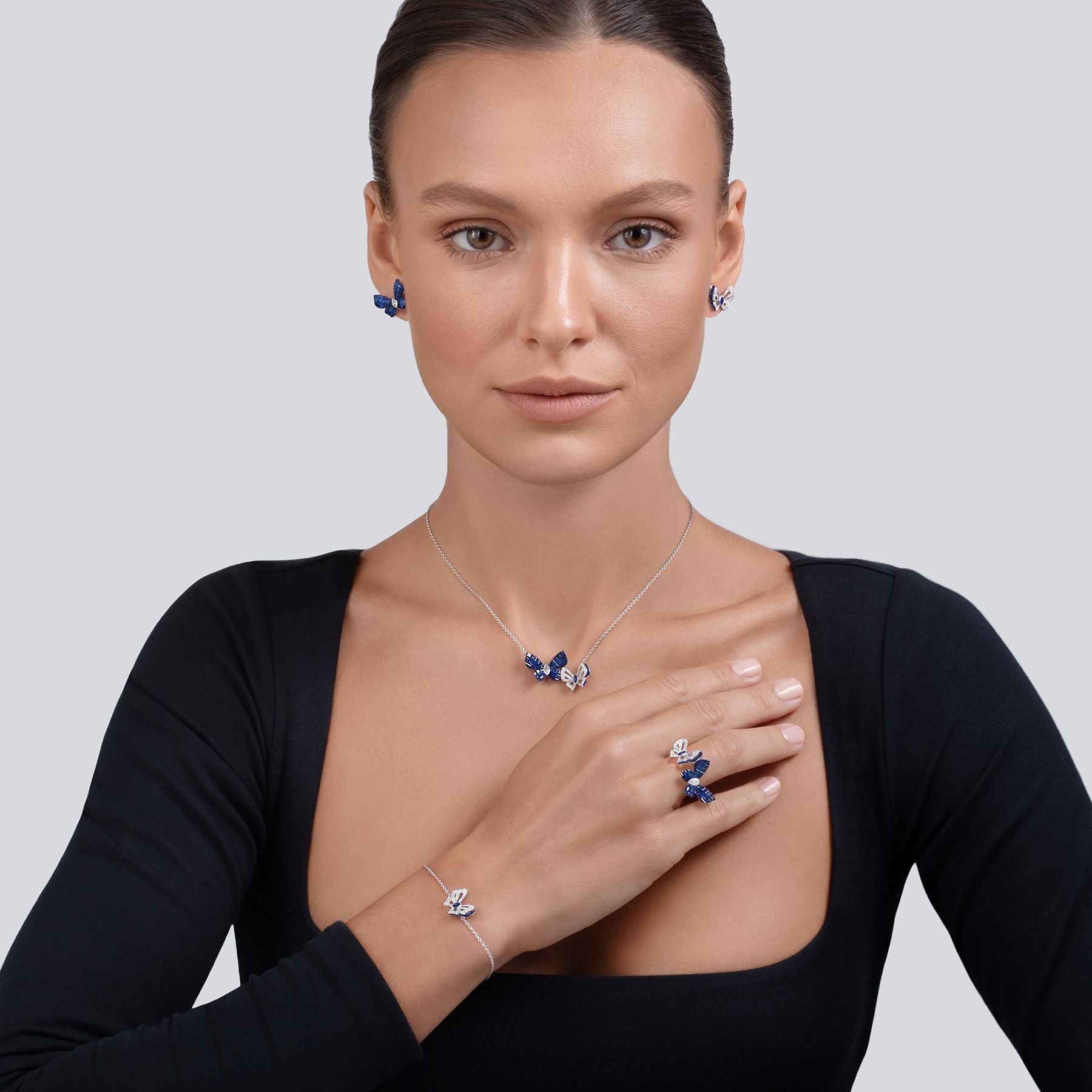 Ring with Butterflies and Blue Sapphire